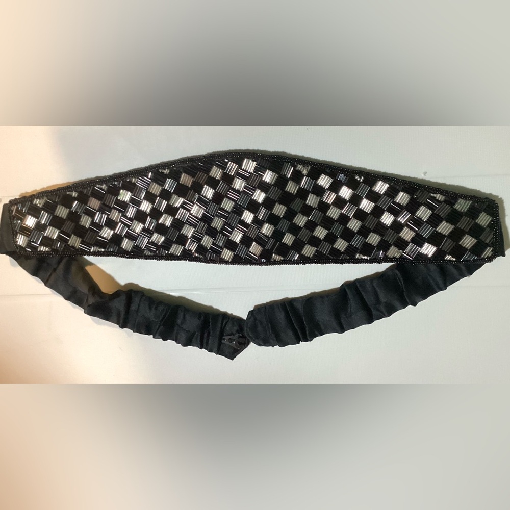 Morgan Taylor shiny beaded belt. Adjustable waist. 16 1/2”